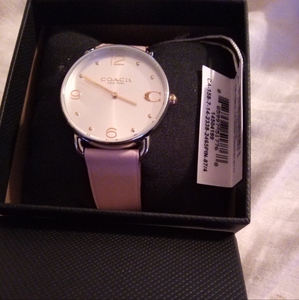 Coach Pink Watch with Minimalist Design and Silver-Toned Case